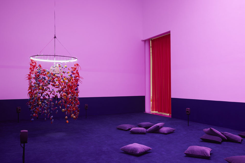 Alex Cecchetti, Singing Chandelier (2018) 1000 unique blown glass pieces, waterphone, iron structure. Installation view: At the Gates of the Music Palace, Spike Island, Bristol. Photograph by Stuart Whipps