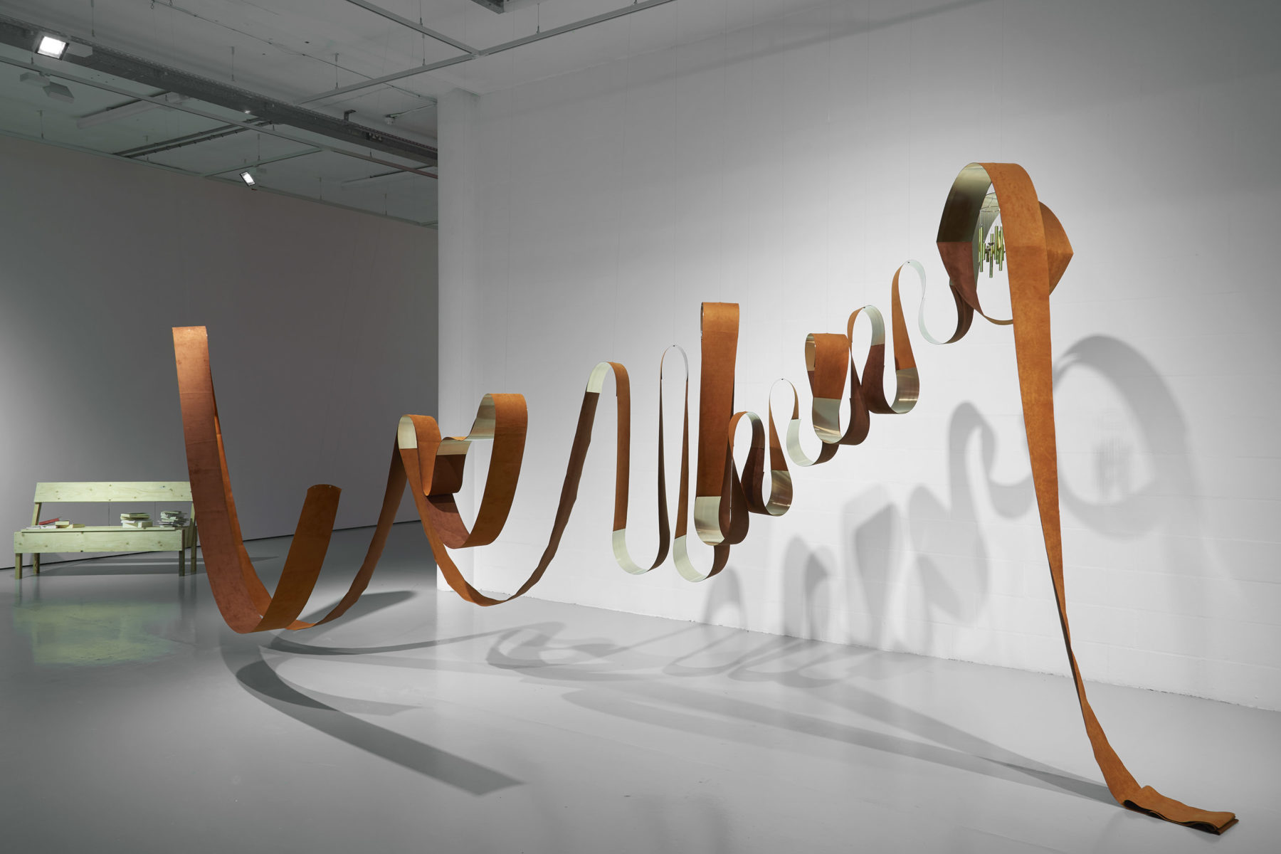 Alex Cecchetti, Singing line (2018) Alcantara, glass, metal, copper, story, wind chimes Produced thanks to Traudi Messini . Installation view, At the Gates of the Music Palace (2018) Spike Island. Photograph by Stuart Whipps