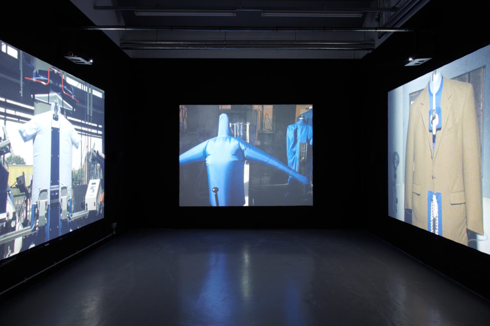 Installation view of Anna Franceschini THE STUFFED SHIRT (2012). Three projections of an inflated shirt.