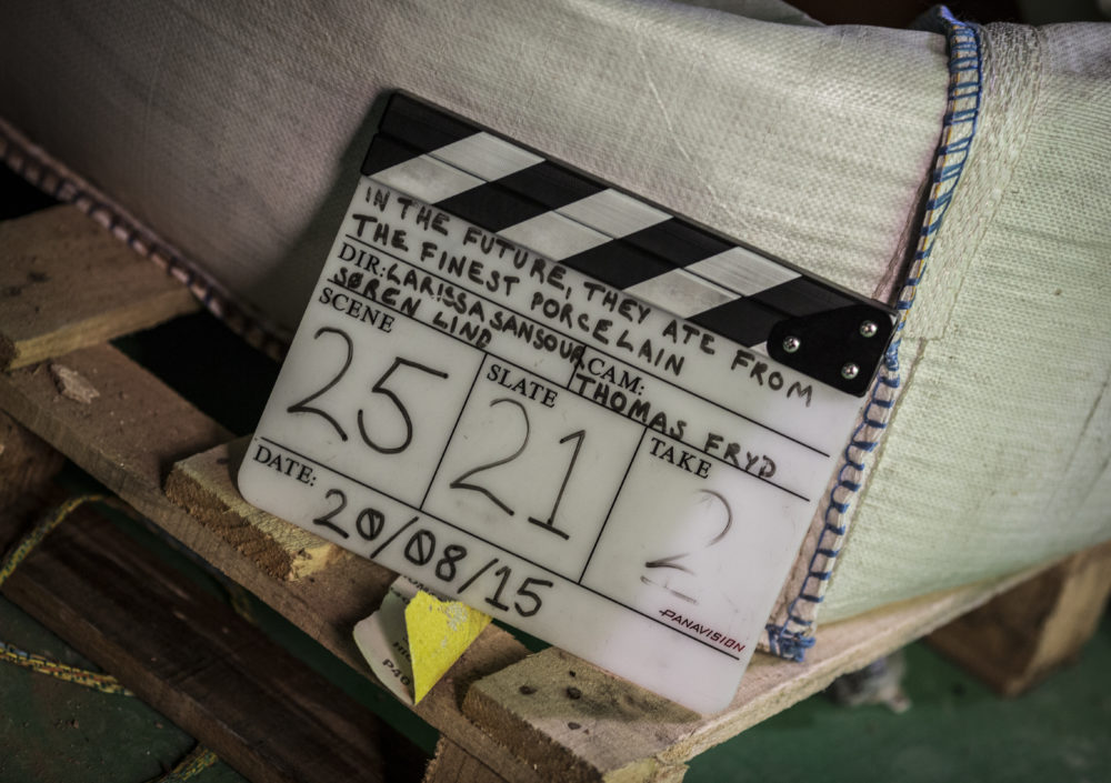 Production shot: A clapboard shows 