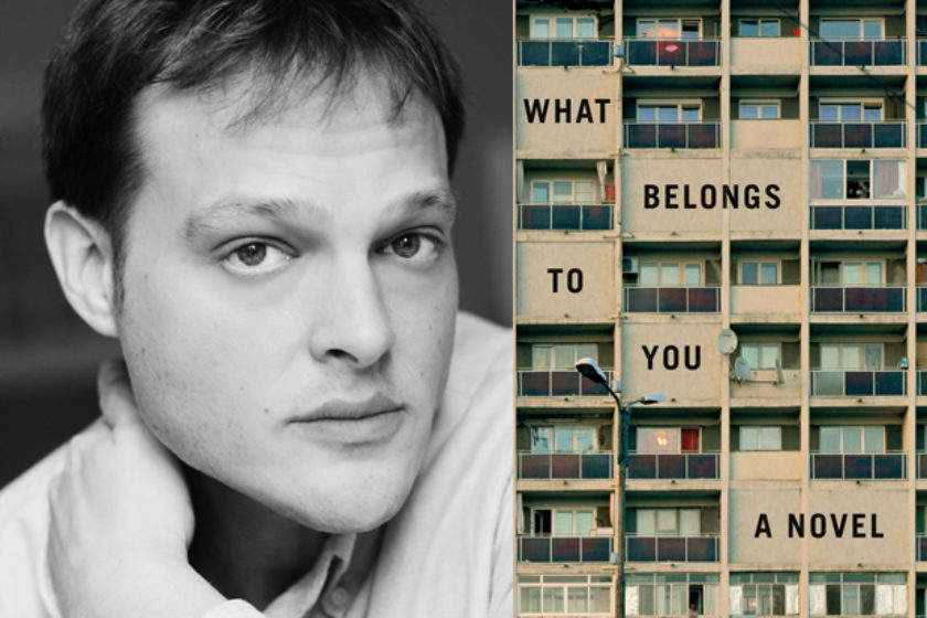 A photograph of the author Garth Greenwell next to their book What Belongs To You.