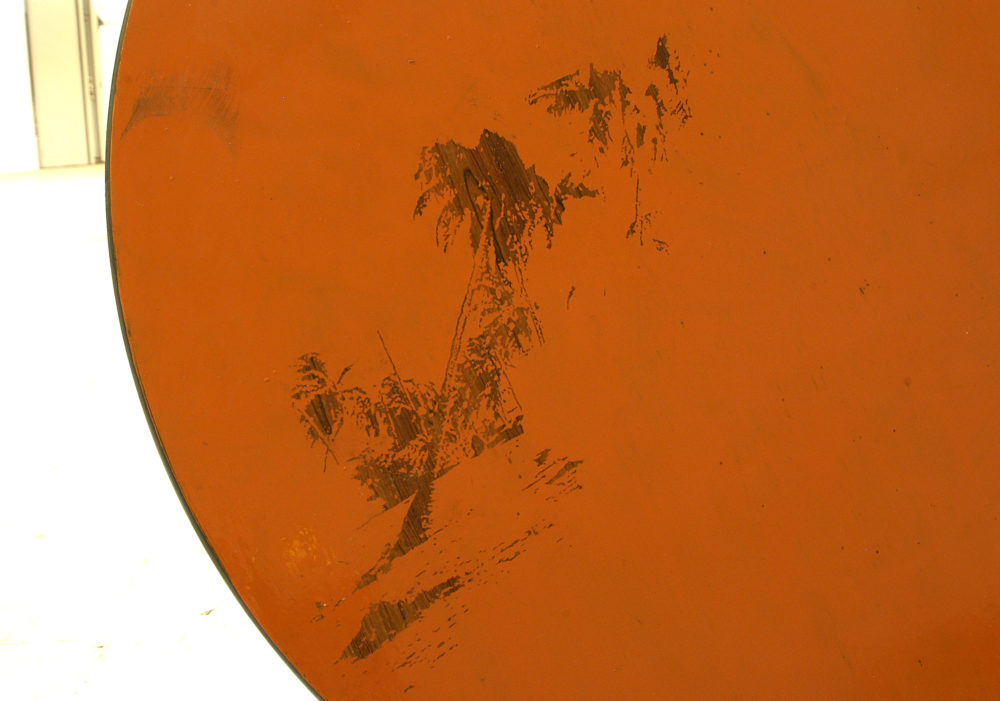 Installation view of Spin Cycle (2004). A close up of a large red cut out circle.