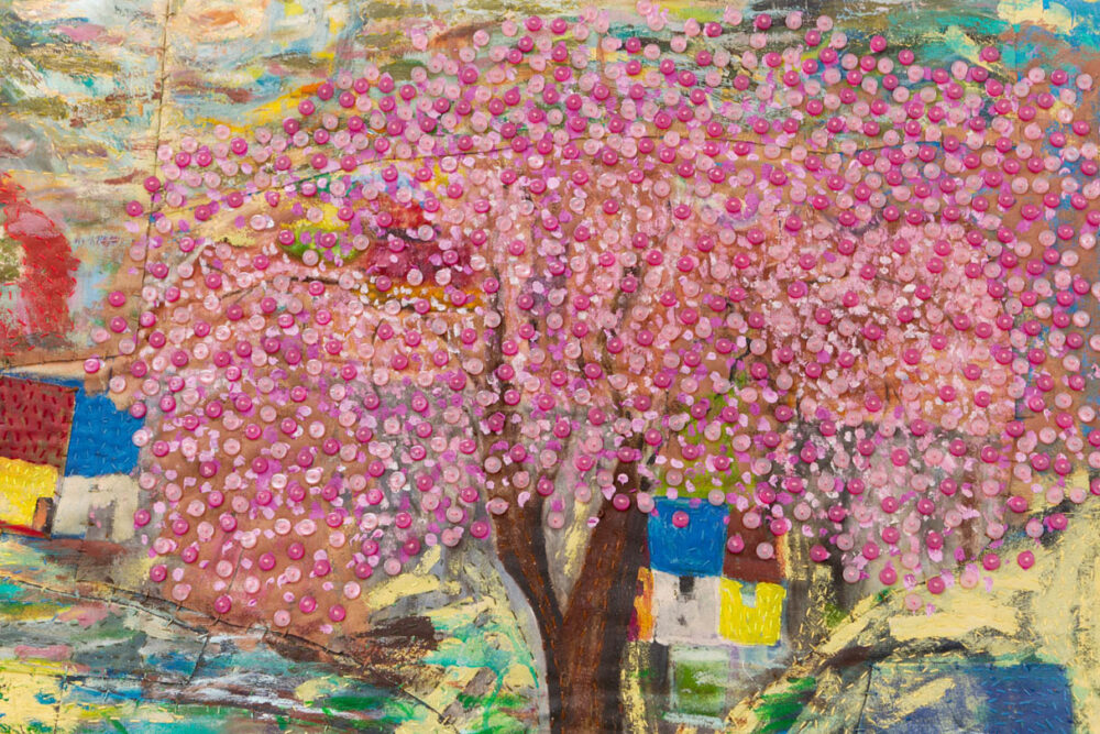 Close up of pacita abad artwork with colourful beads sewn into a canvas in the shape of a tree