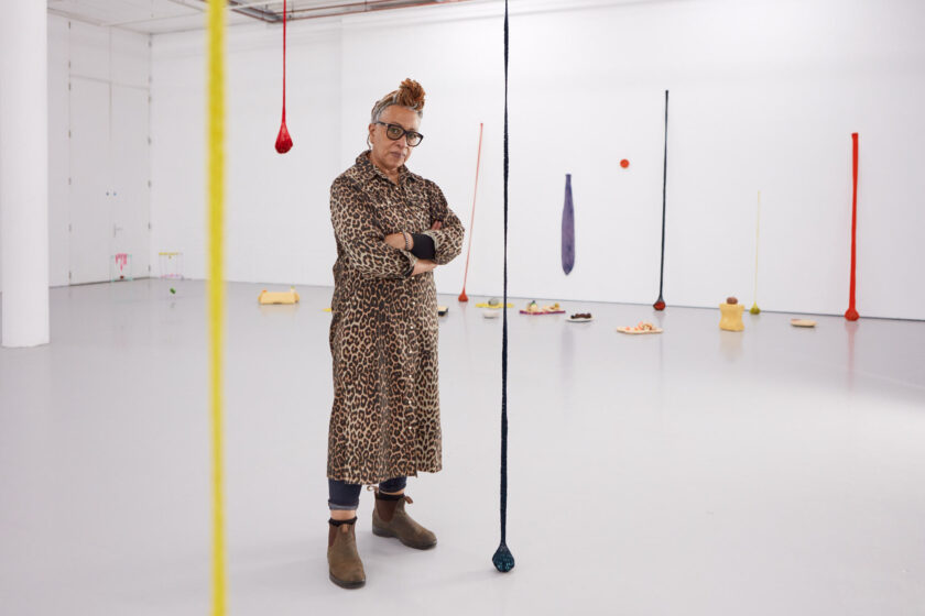 Portrait of Veronica Ryan with her exhibition, Along a Spectrum at Spike Island