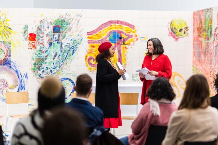 Photograph of Lucy Stein and Maria Christoforidou Performing the Question in the exhibition Wet Room at Spike Island