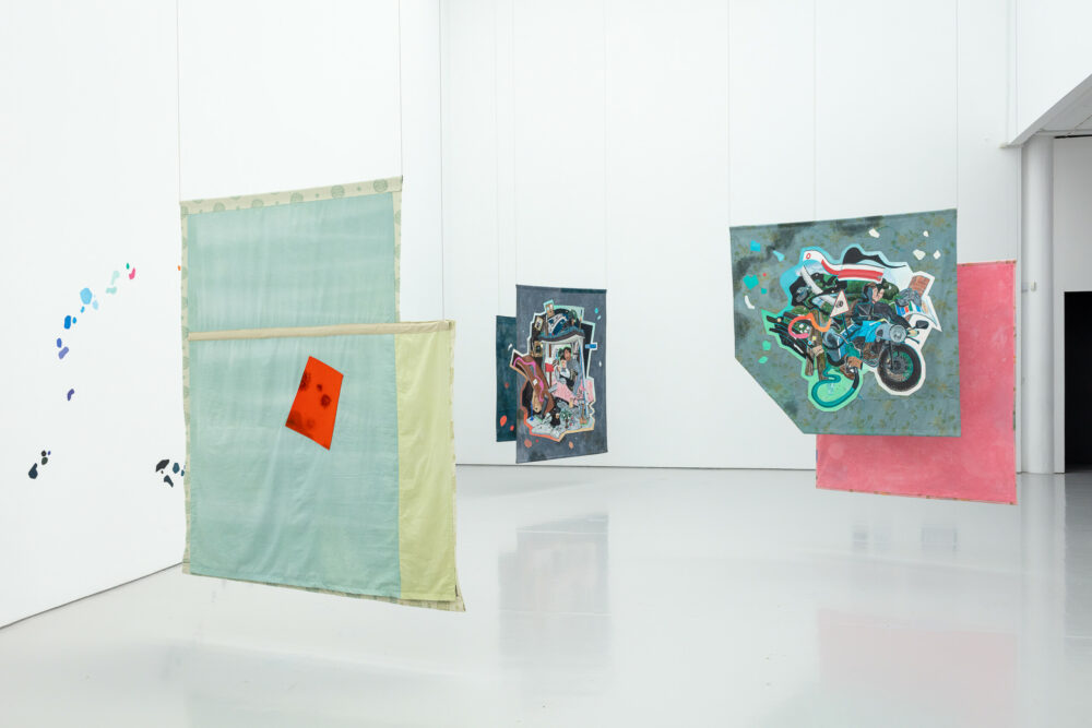 Paintings by Flo Brooks hanging in Spike Island's gallery