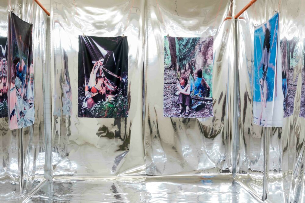 Image of four paintings by UWE Fine Arts Student hung up at Spike Island art gallery