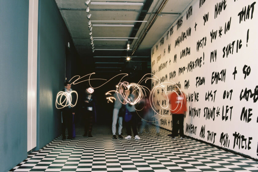 Children in Spike Island gallery photographing lights using long exposure