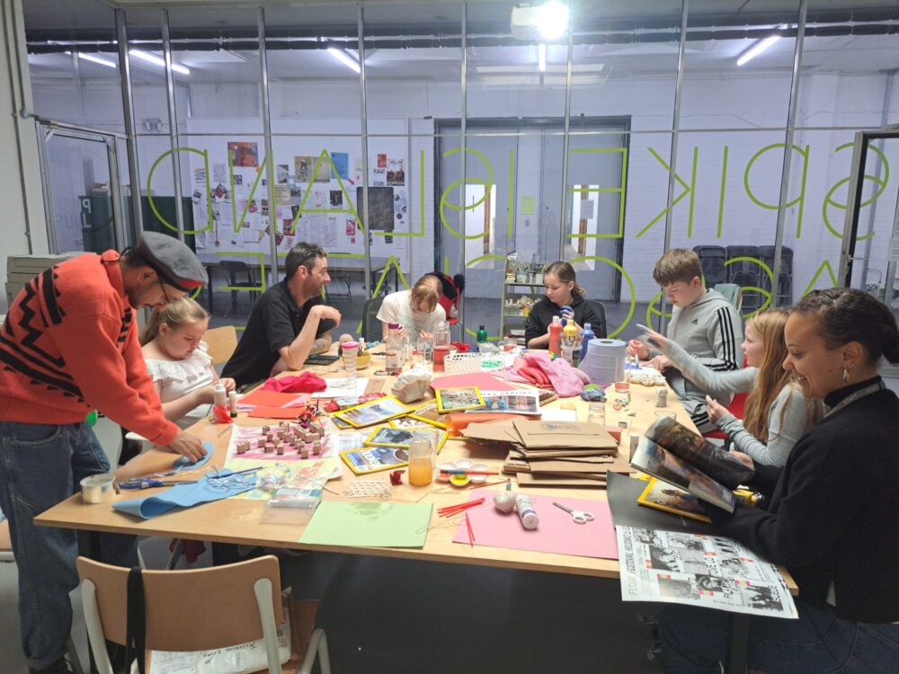 Group of people sat around a table participating in a workshop